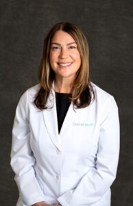 Headshot of Shera Newcomb, DMD
