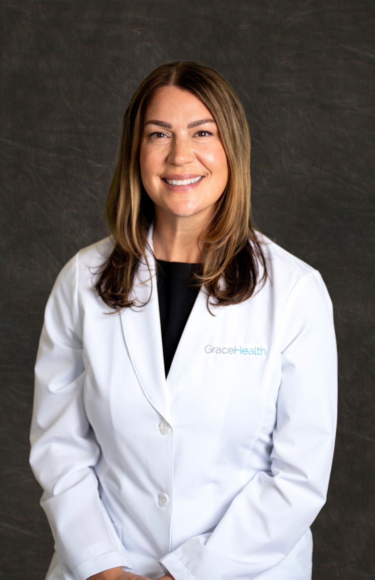Headshot of Shera Newcomb, DMD